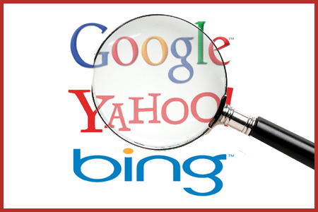 Logos for search engines Google, Bing and Yahoo looking through a magnifying glass.